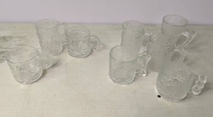 lot 259 image: Batman and The Flinstones Frosted Glass McDonalds Mugs