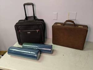 lot 352 image: Briefcases and Foam Muscle Rollers