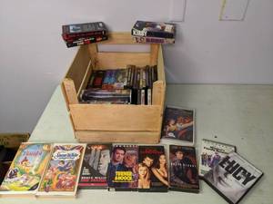 lot 292 image: Lot of VHS Tapes and DVDs Scarface, The Matrix, The Goonies, etc.