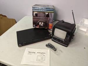lot 312 image: DVD Player and Mini Portable TV
